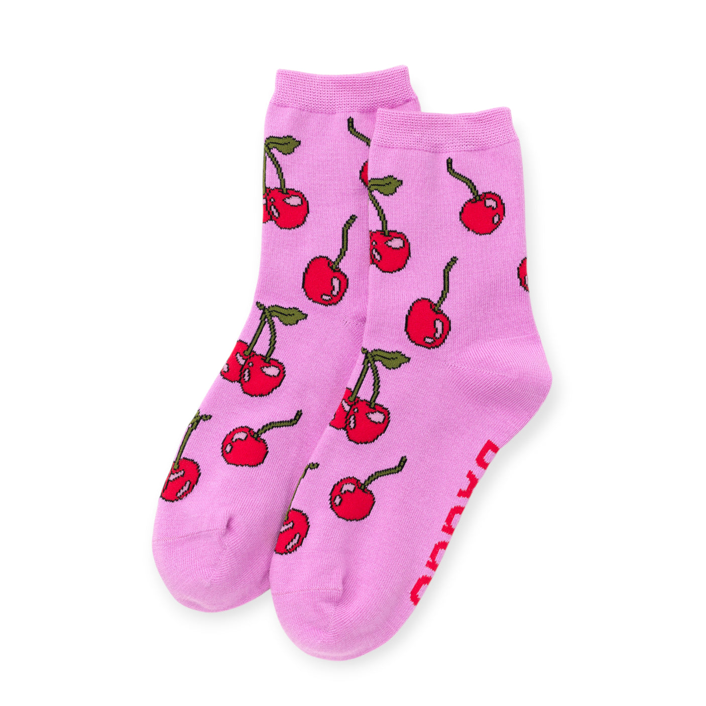 Pair of pink ankle socks with red cherries and green leaves pattern on plain white background