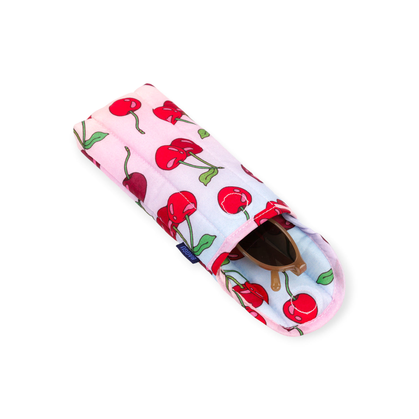 Soft fabric eyeglass pouch with red cherry print and pink trim partially holding brown sunglasses