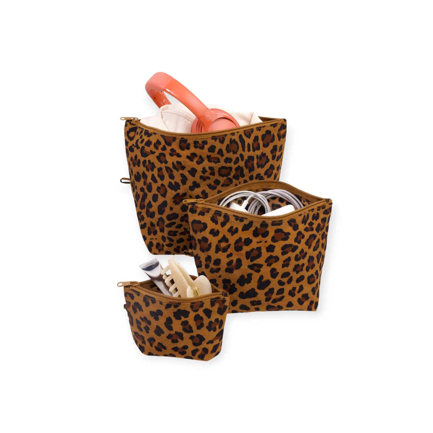 Leopard-print zippered pouches set with three nested pouches, one open
