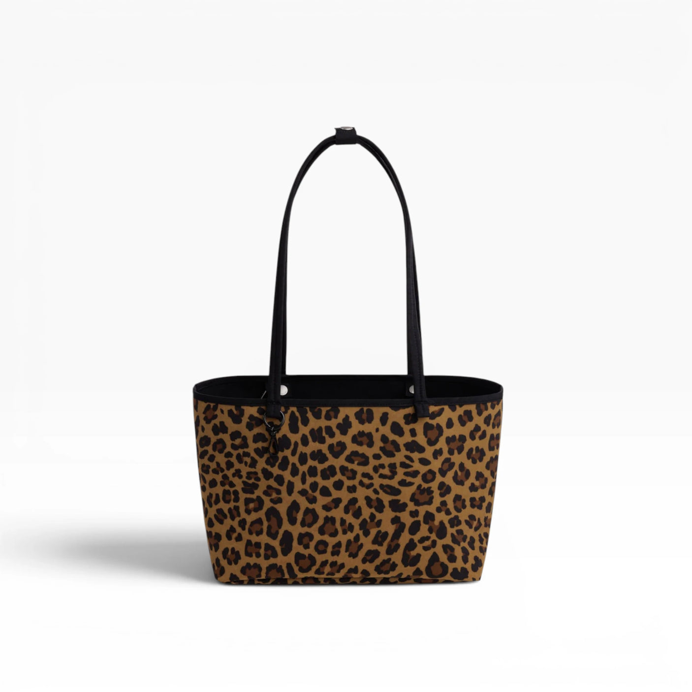 Medium reversible tote bag, leopard print exterior with black top handles