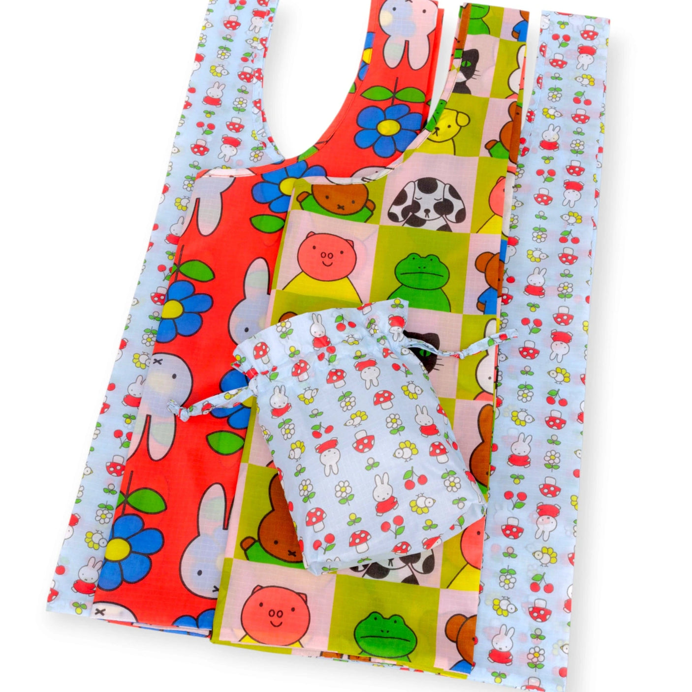Three-bag tote set with colorful animal block prints and white patterned panels