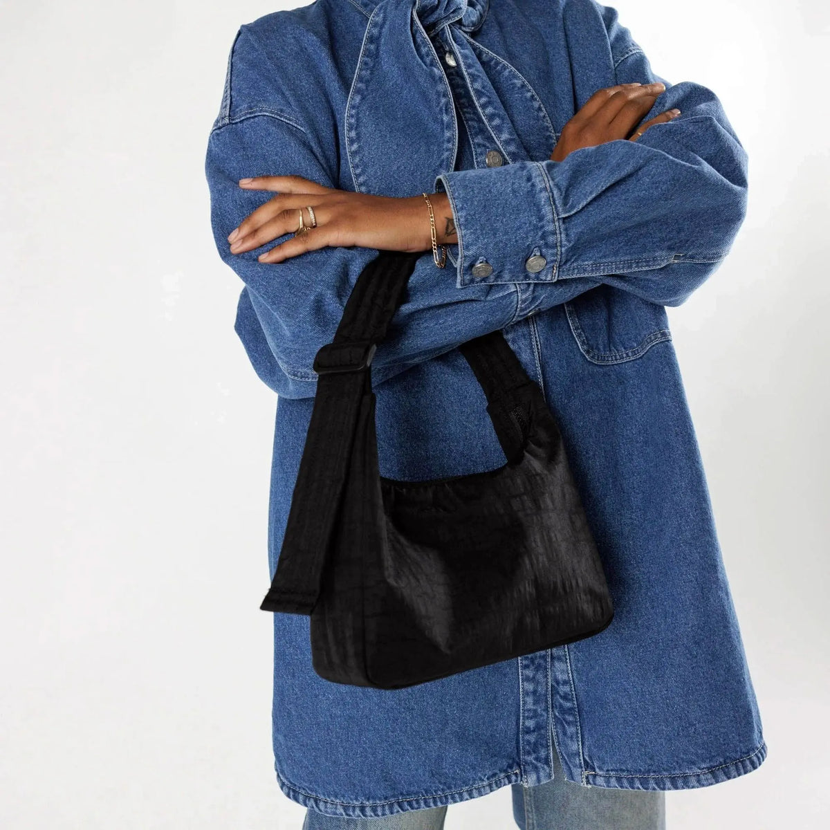 Baggu mini nylon shoulder bag, black with adjustable strap and drawstring side pocket