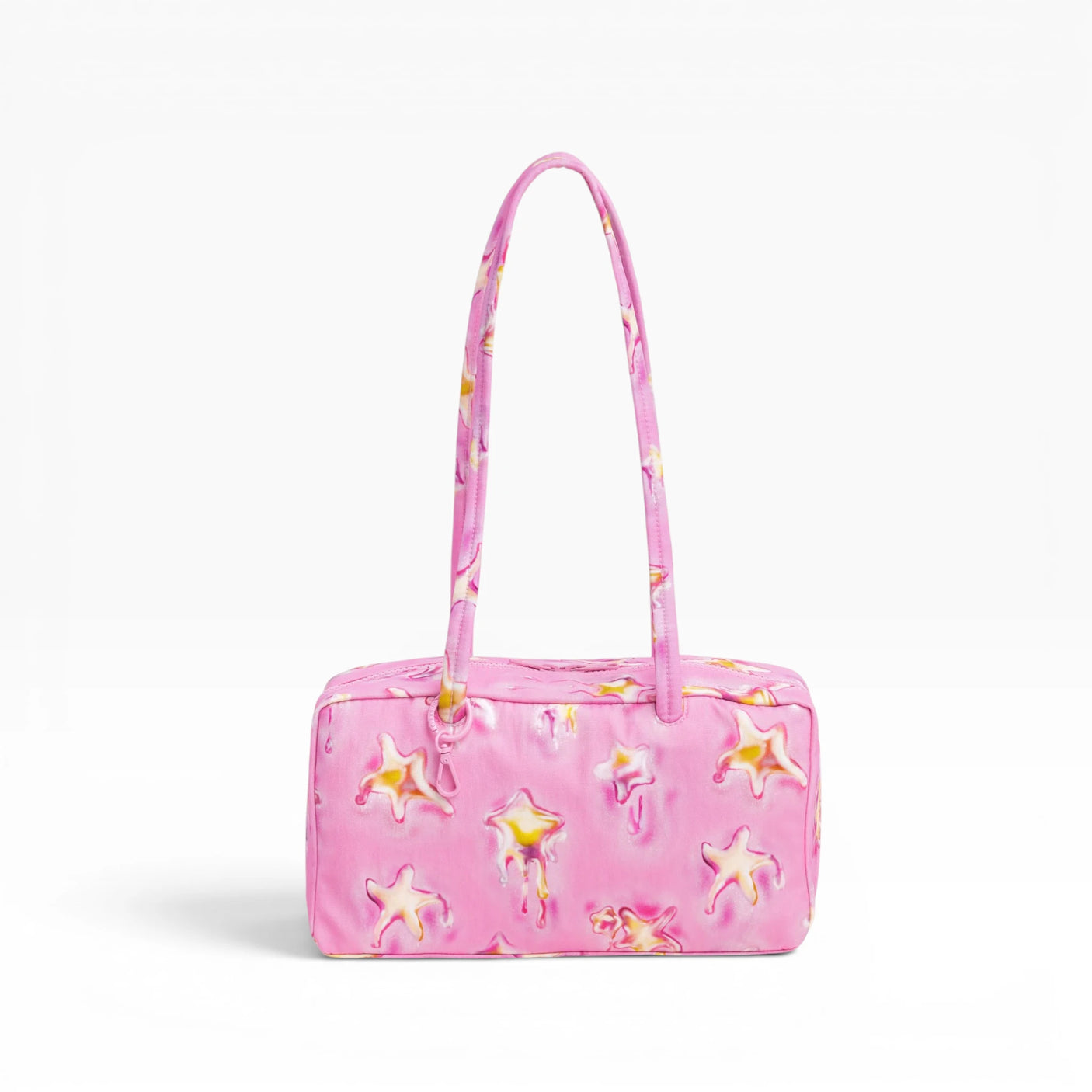 Baggu pink nylon bowler bag with star pattern and top handles