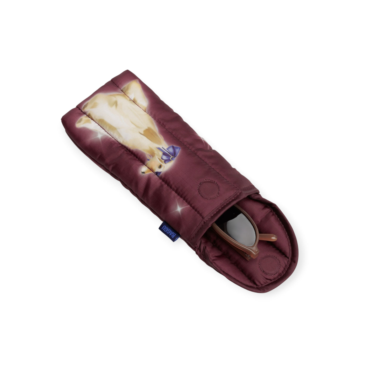 Maroon Baggu Puffy Glasses Sleeve with illustrated fancy dog wearing a blue bow and blue Baggu tag on side