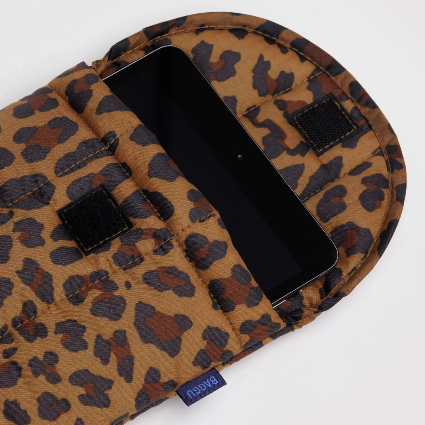 Leopard-print puffy tablet case with black interior and snap tab closure