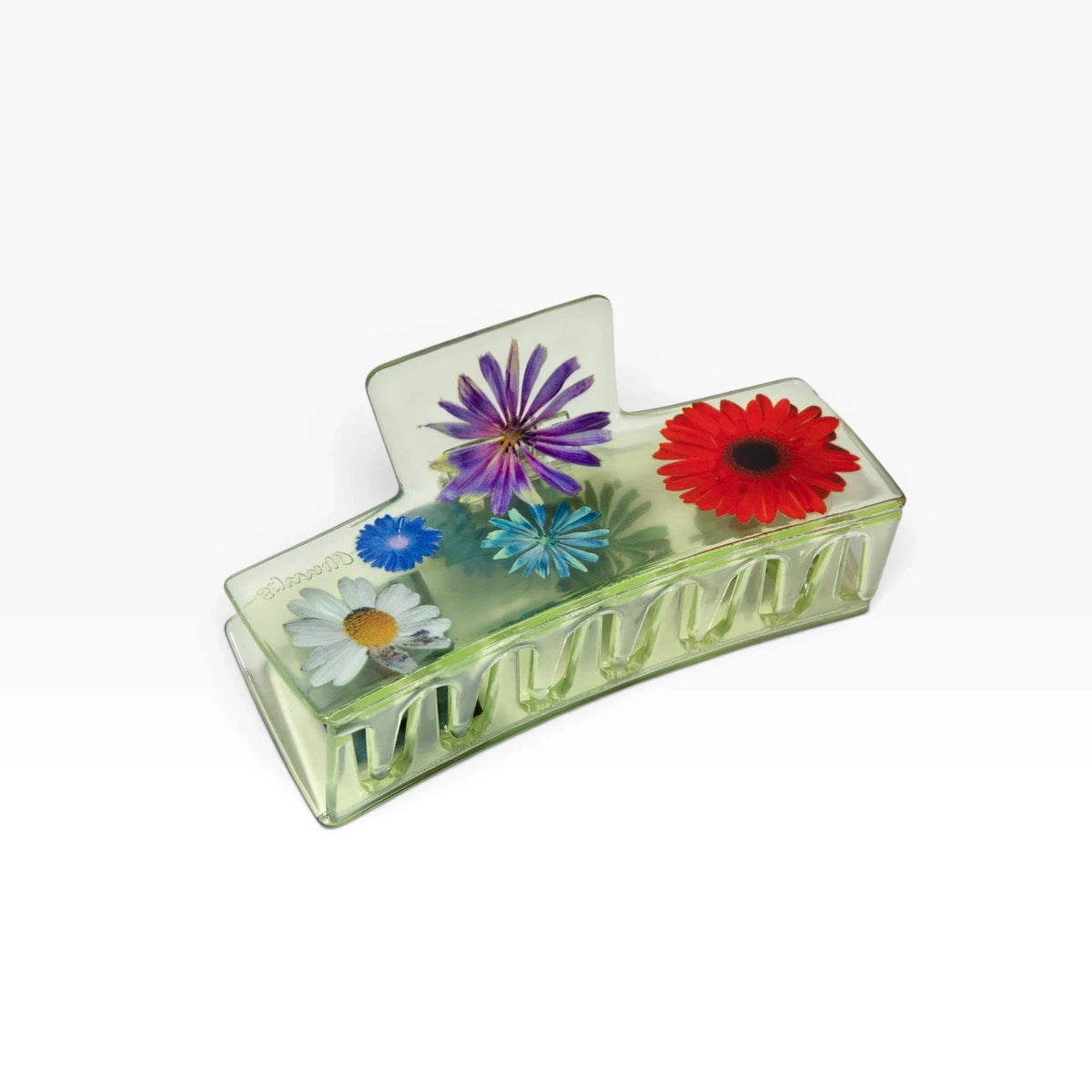 Transparent claw clip with colorful flower prints on clear green base