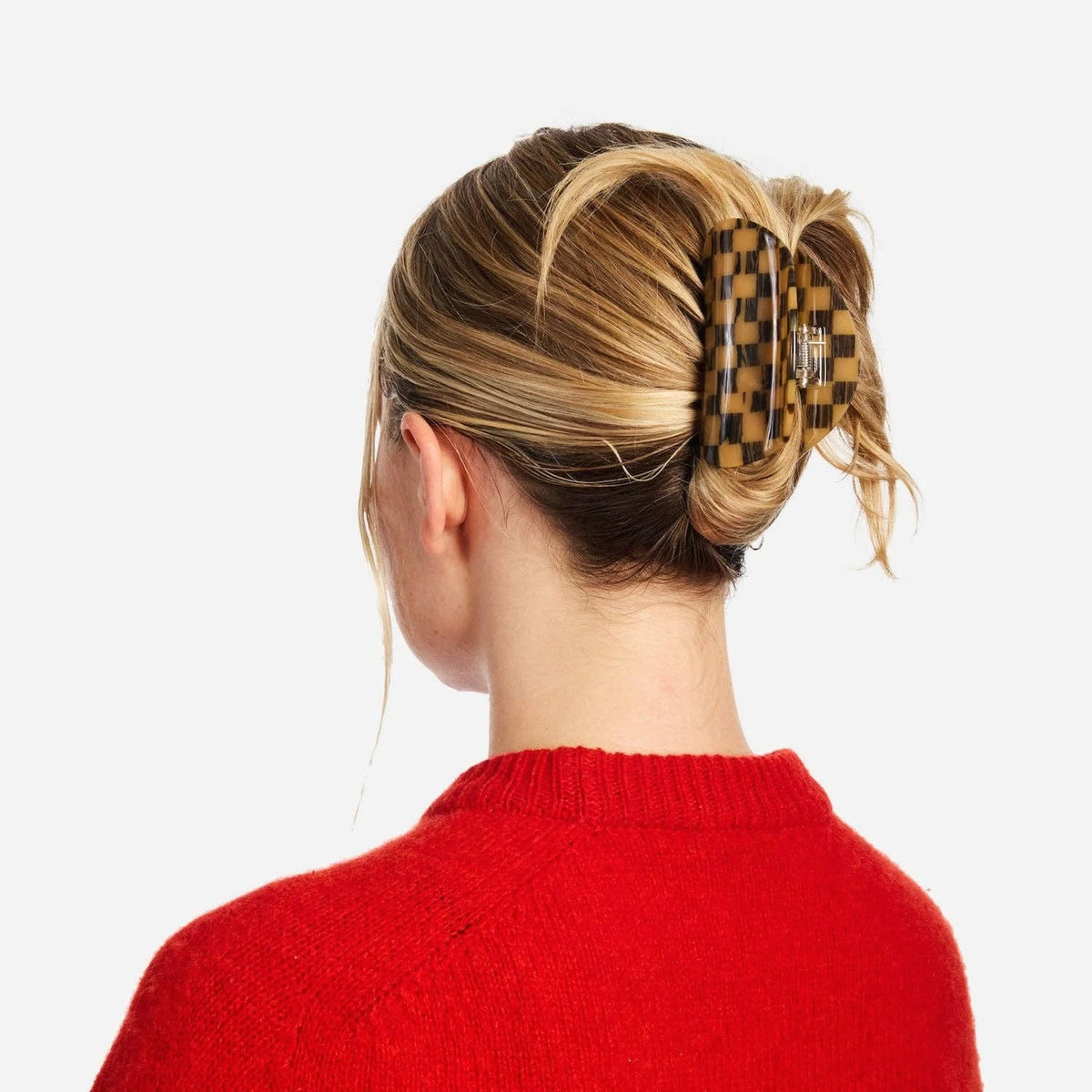 Mocha checker claw hair clip clipped in blonde hair