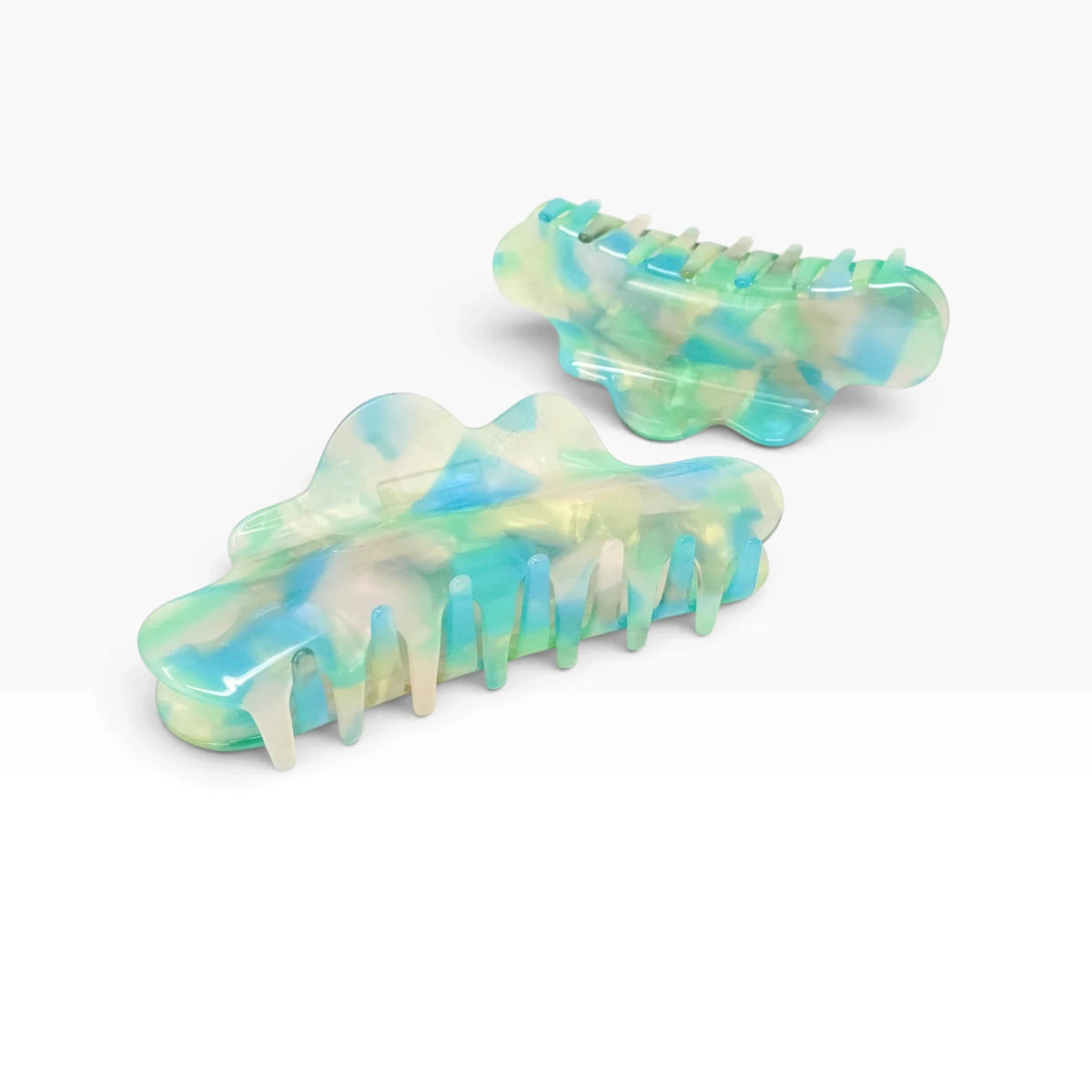 Translucent jelly claw clip in aqua and mint green, open hinged style
