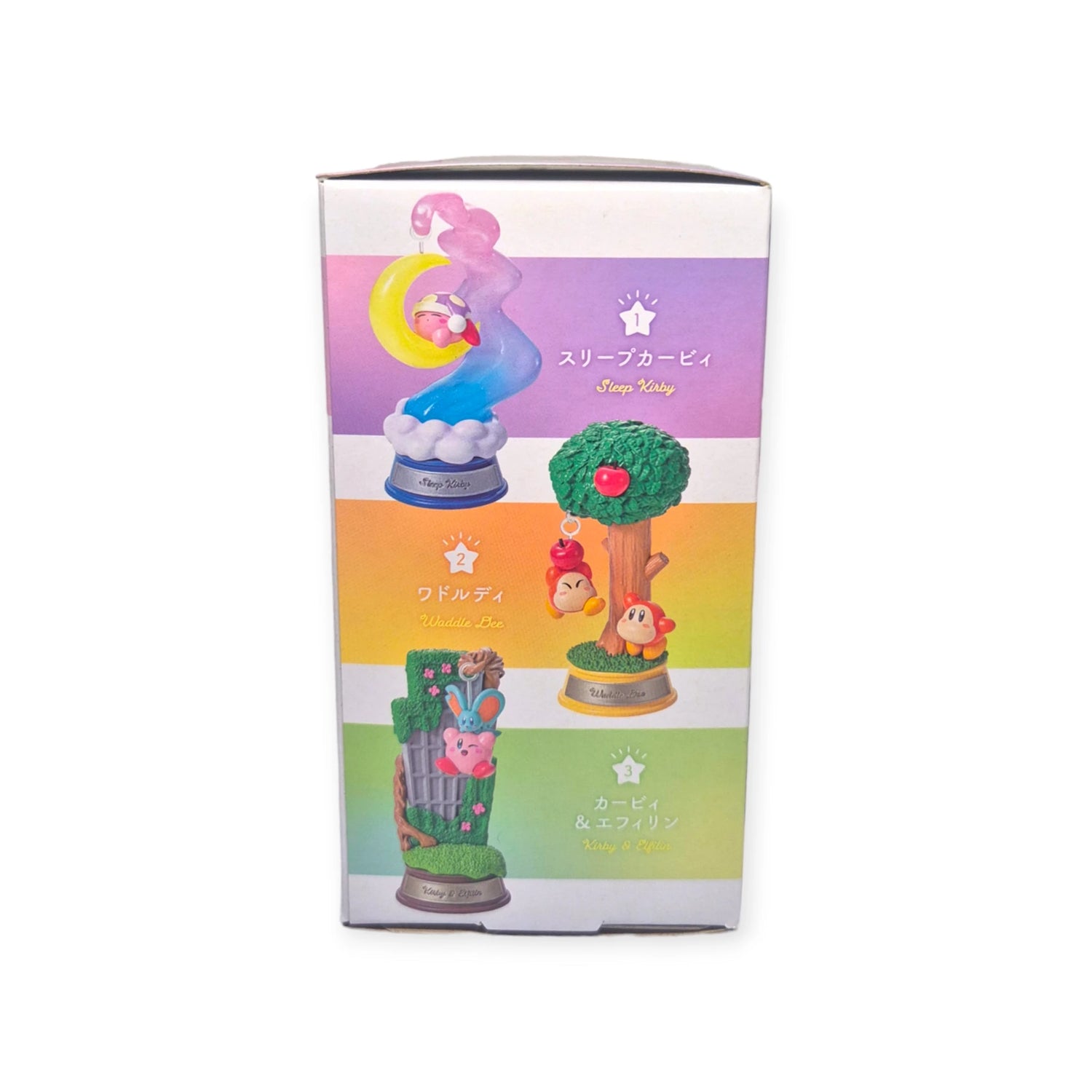 The Re-Ment Kirby Blind Box - Dream Land features vibrant illustrations of collectible figures, including Sleep Kirby on a cloud, Waddle Dee on a tree, and Kirby with Magolor on grass. The combination of Japanese and English writing enhances its appeal.