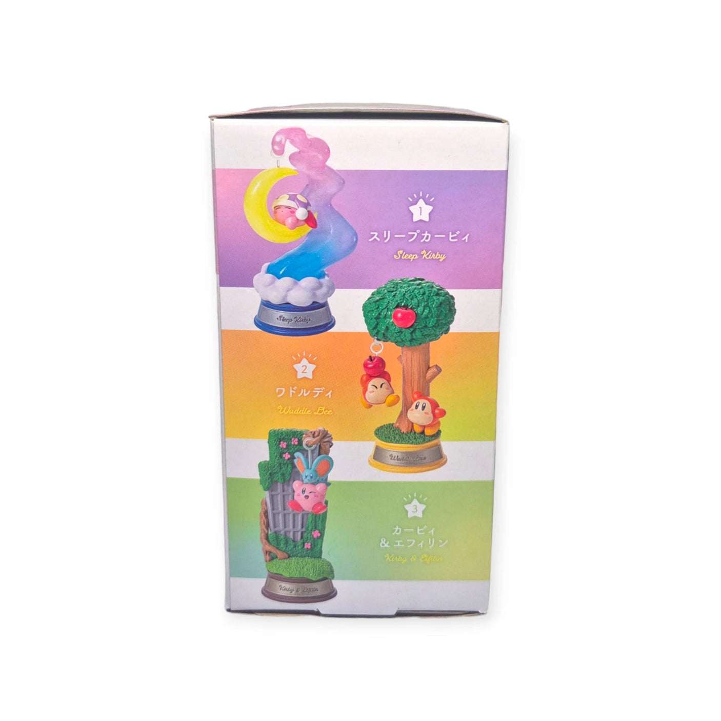 The Re-Ment Kirby Blind Box - Dream Land features vibrant illustrations of collectible figures, including Sleep Kirby on a cloud, Waddle Dee on a tree, and Kirby with Magolor on grass. The combination of Japanese and English writing enhances its appeal.