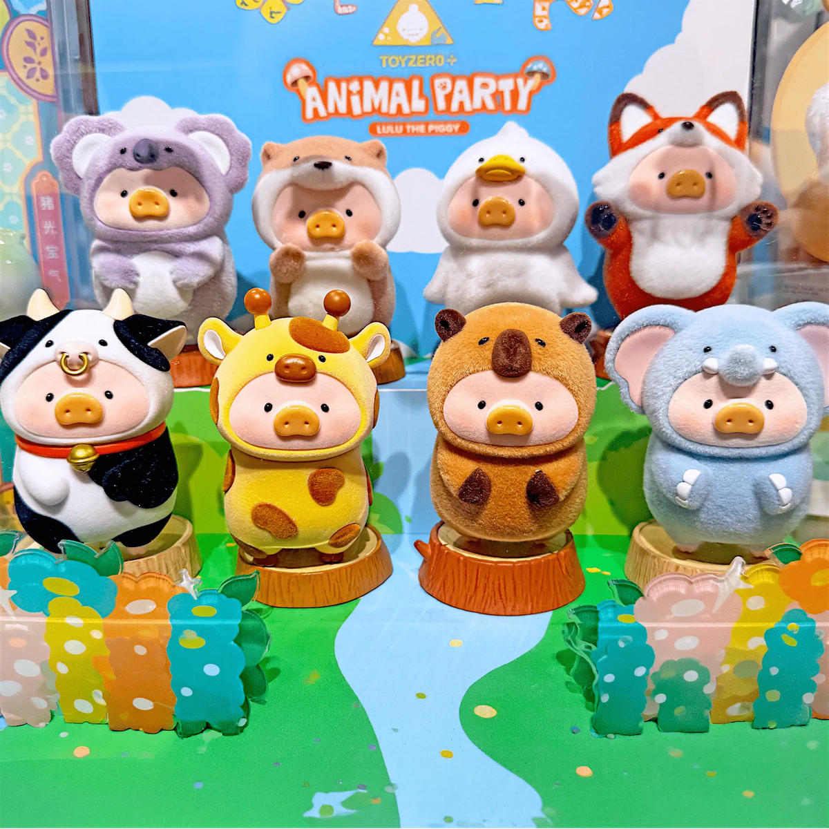 Animal party blind box display with multiple pig figures in different costumes