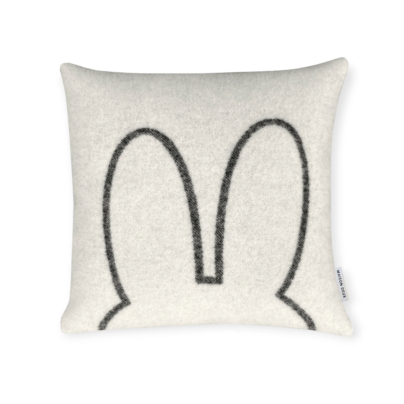 The Miffy Cushion Cover - Premium Wool by Miffy features a minimalist black outline of two upright bunny ears on white, plus a side fabric tag for added charm.
