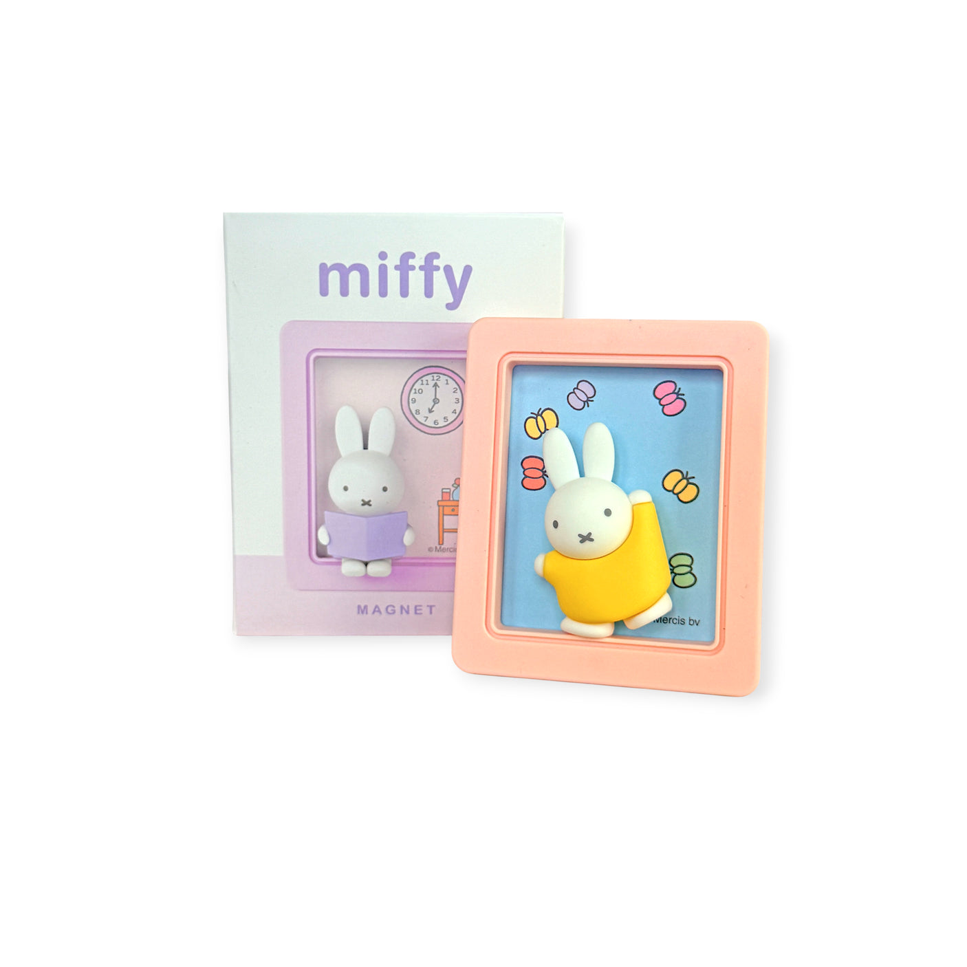 Miffy magnetic photo frame and phone stand in pastel peach with bunny figure on colorful background and packaging box