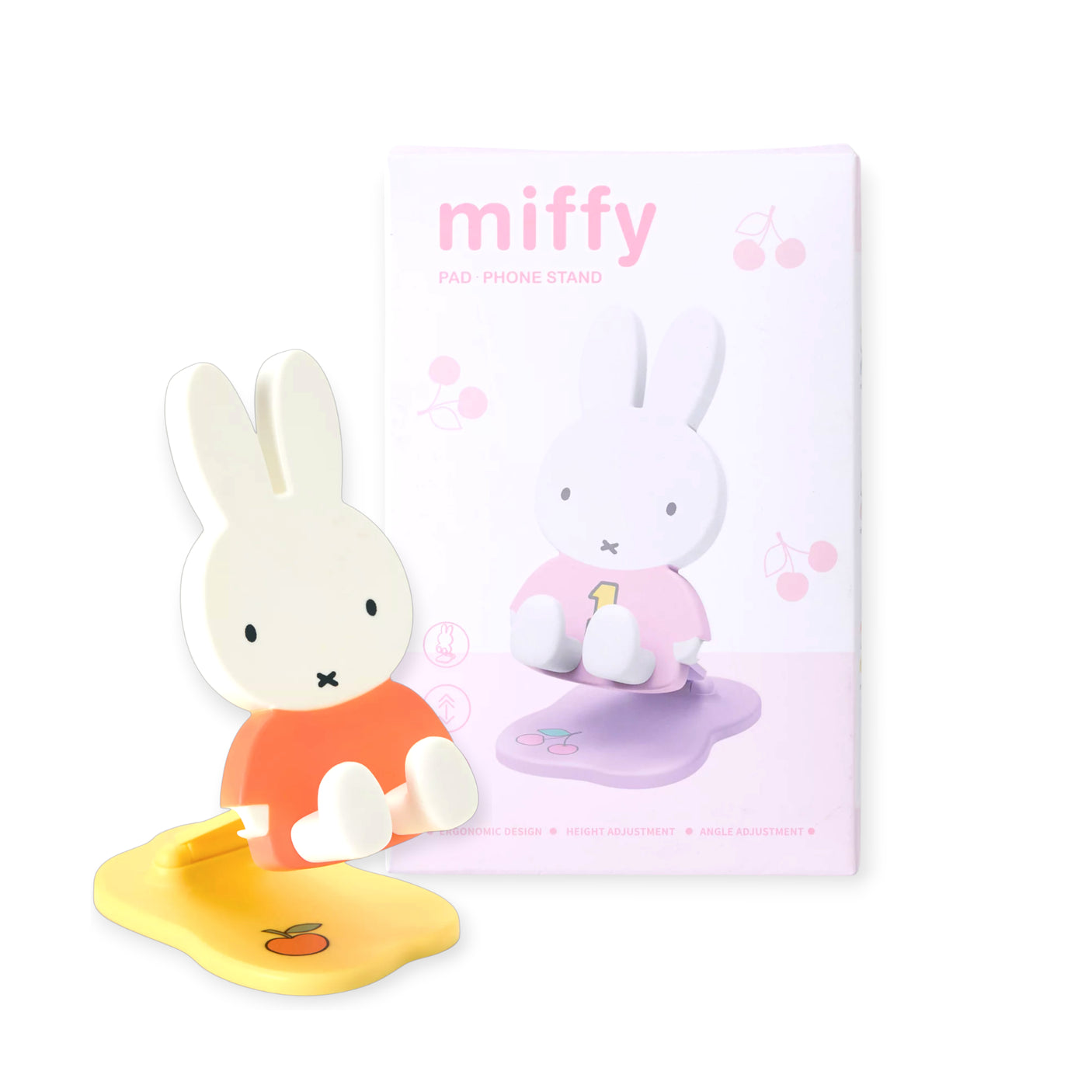 Pastel Miffy figure phone and tablet stand with orange shirt and yellow base featuring a cherry icon beside pink packaging
