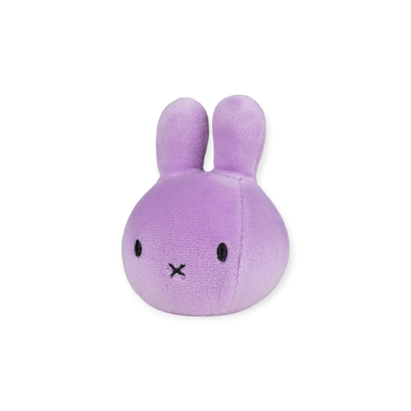 The Miffy Squish Relief Ball - Lilac by Miffy is a small, round, light purple bunny plush with simple black eyes and an X-shaped mouth, featuring eco-friendly filling for stress-busting comfort.