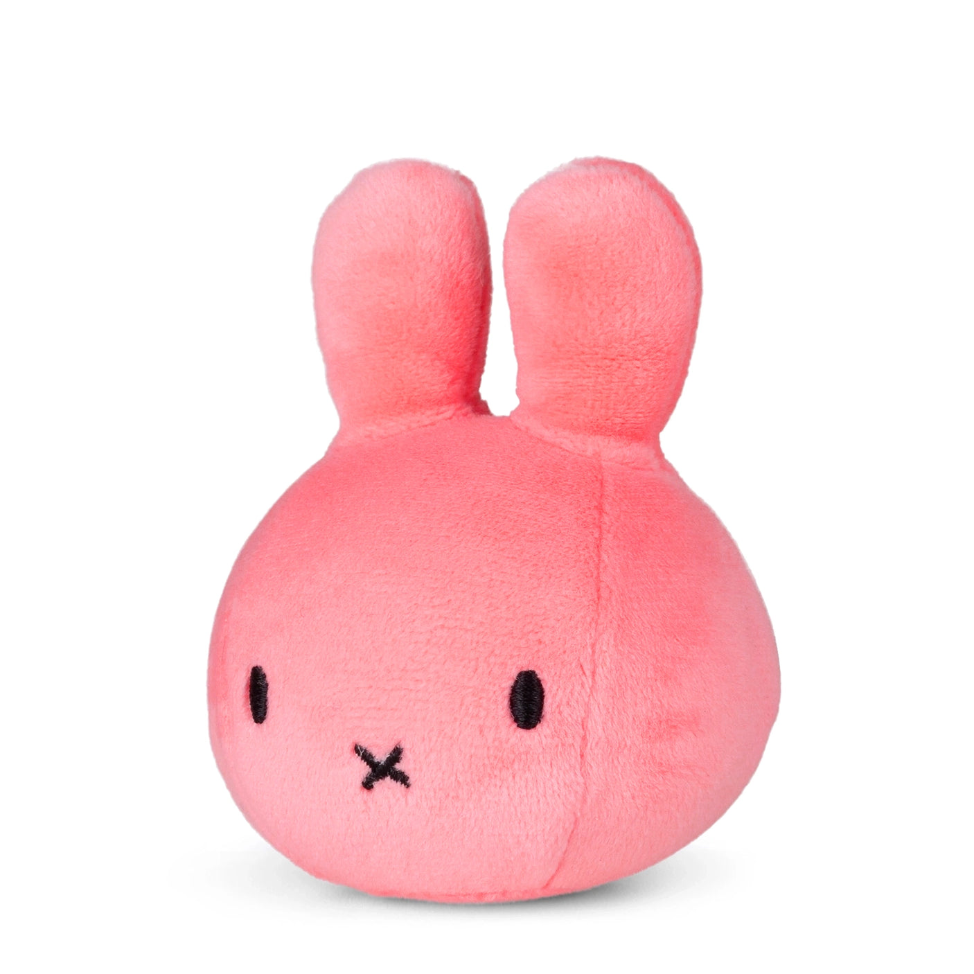 The Miffy Squish Relief Ball - Pink by Miffy is a round, pink plush toy with upright ears and an X-shaped mouth, resembling a rabbit—perfect as a cute sensory toy for stress relief.