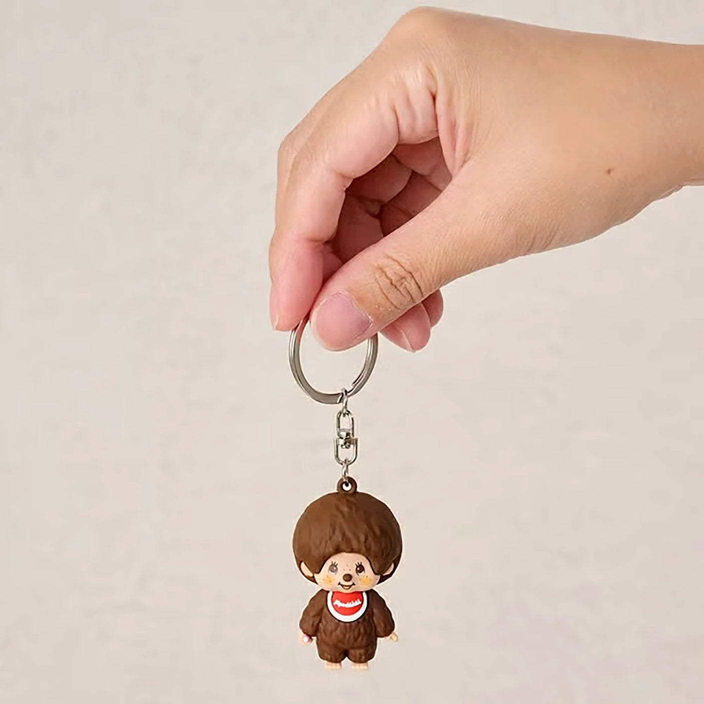 Monchhichi mini figure keychain boy, brown plush mini figure held on metal key ring