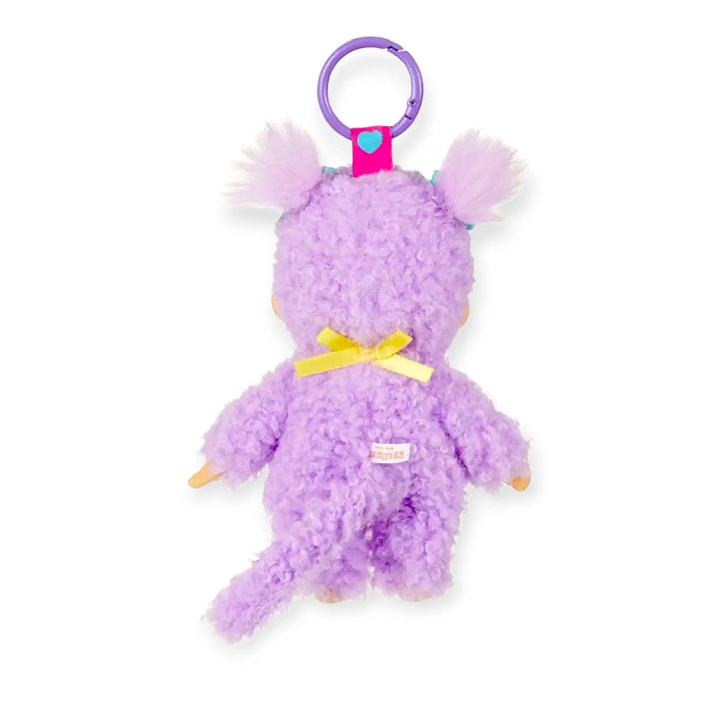 Back view of purple Monchhichi Sweet Lollipop bag charm with fluffy fur, pastel pigtails, and yellow ribbon hanging from purp