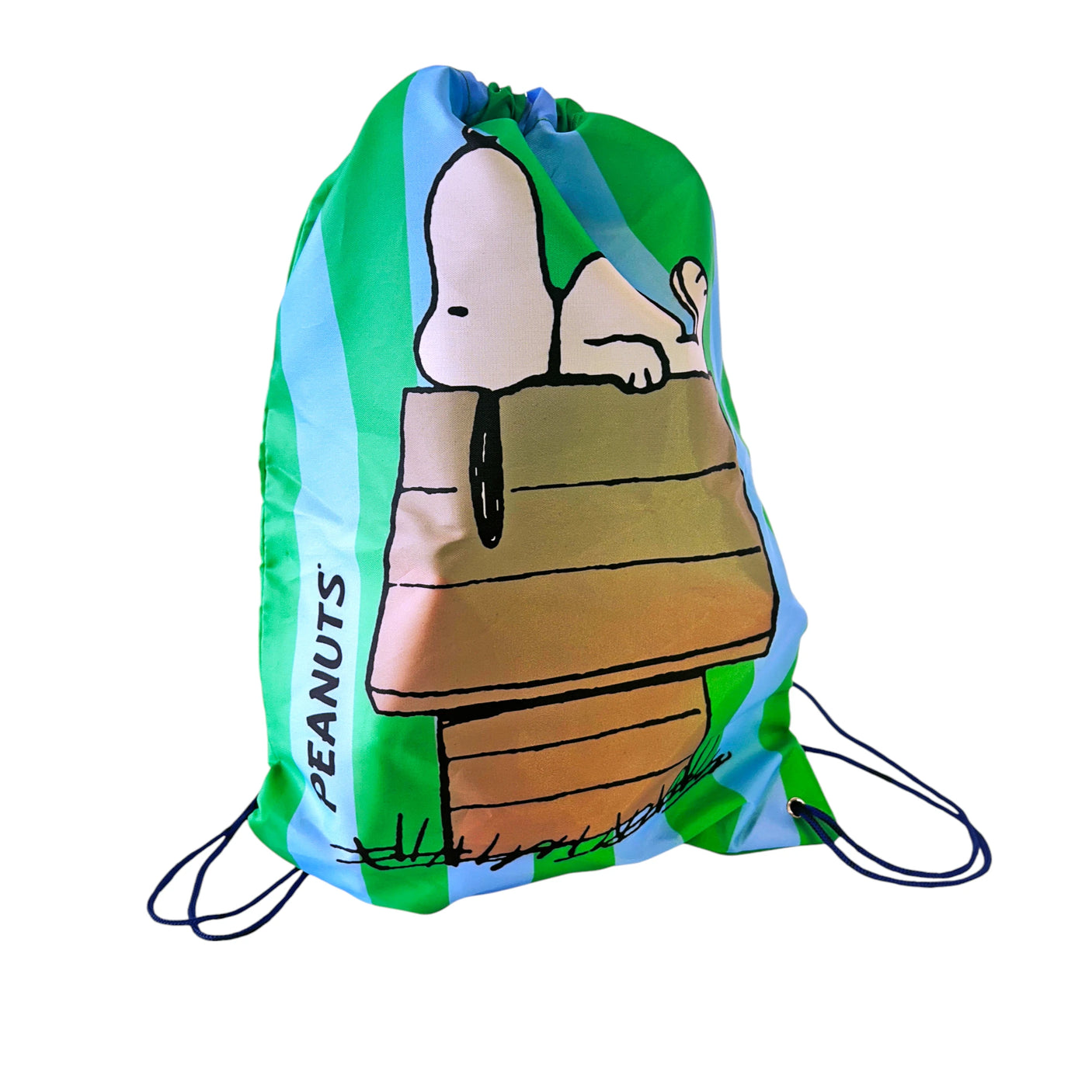 Green and blue Peanuts drawstring bag featuring Snoopy lying on doghouse with black cords and PEANUTS text on side