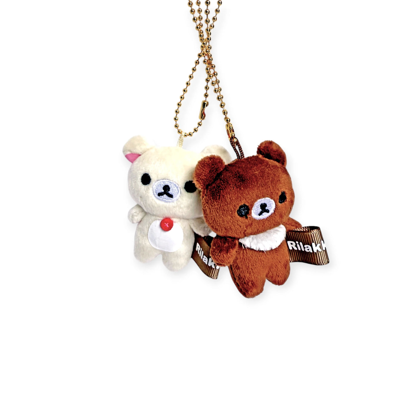 Mini plush keychain duo: white and brown bears with ribbon tags, on gold chain