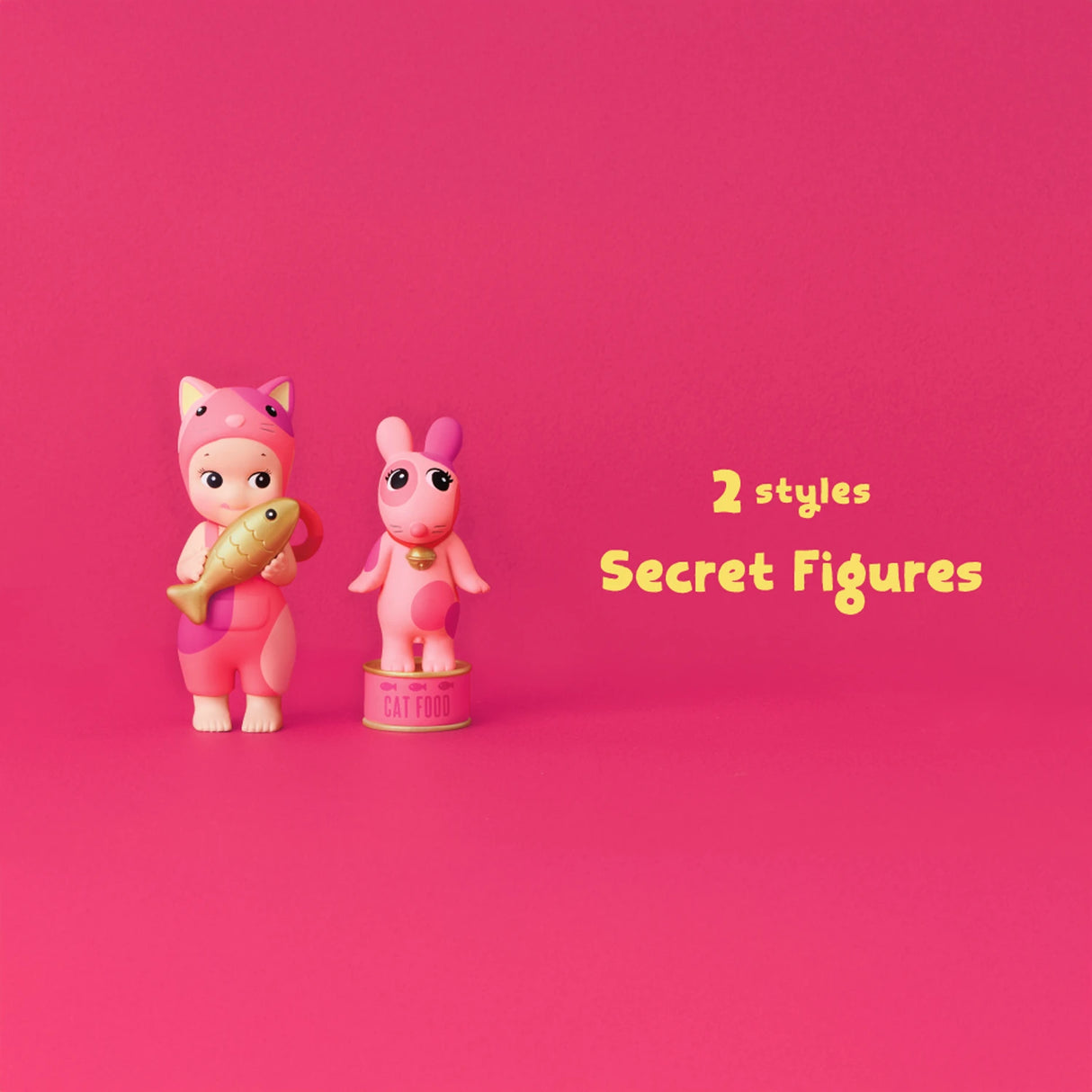 Two toy figures from the Sonny Angel Cat Life Series - Blind Box are displayed on a pink background with the words "2 styles Secret Figures." One figure, dressed in a hoodie and holding a fish, stands beside another figure perched on a can labeled "Cat Food," bringing whimsy to this exclusive Sonny Angel collection.