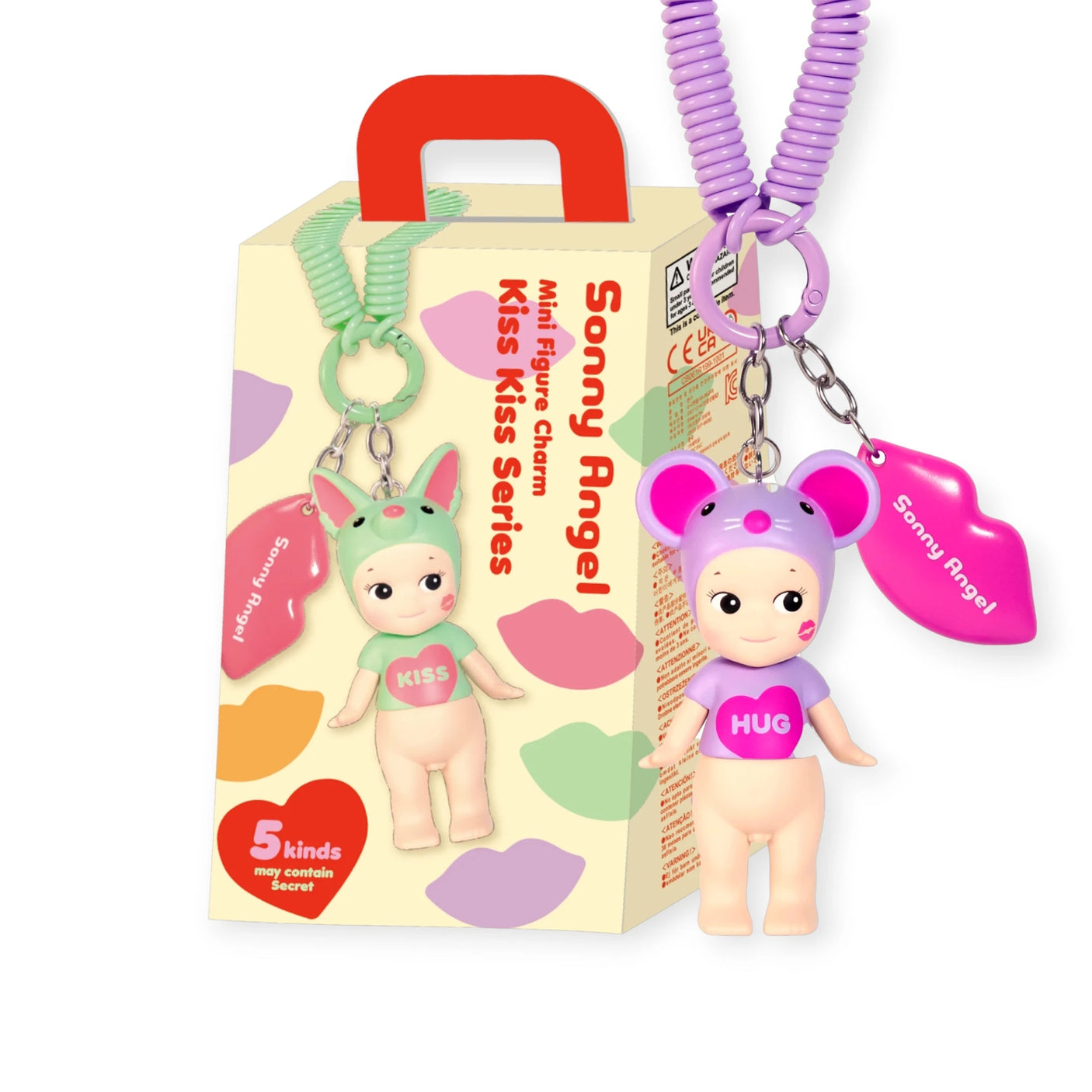 A Sonny Angel Bundle - Kiss Kiss Blind Box + Tote by Sonny Angel is shown with two keychain figures—one green with "KISS," one purple with "HUG"—beside a pink lips keychain and an embroidered tote bag.