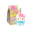 The Hello Kitty Blind Bag - Snack Plushie features a cupcake plush keychain with a pink bow, alongside Hello Kitty and Sanrio characters on the package. Ideal for Sanrio fans, it's a charming surprise and delightful addition to any collection in a cute blind bag bundle.