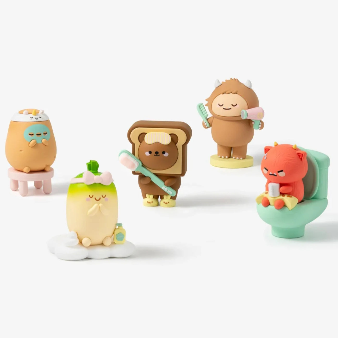Four bathroom blind box figures: egg, bear toast, shower character, and orange cat