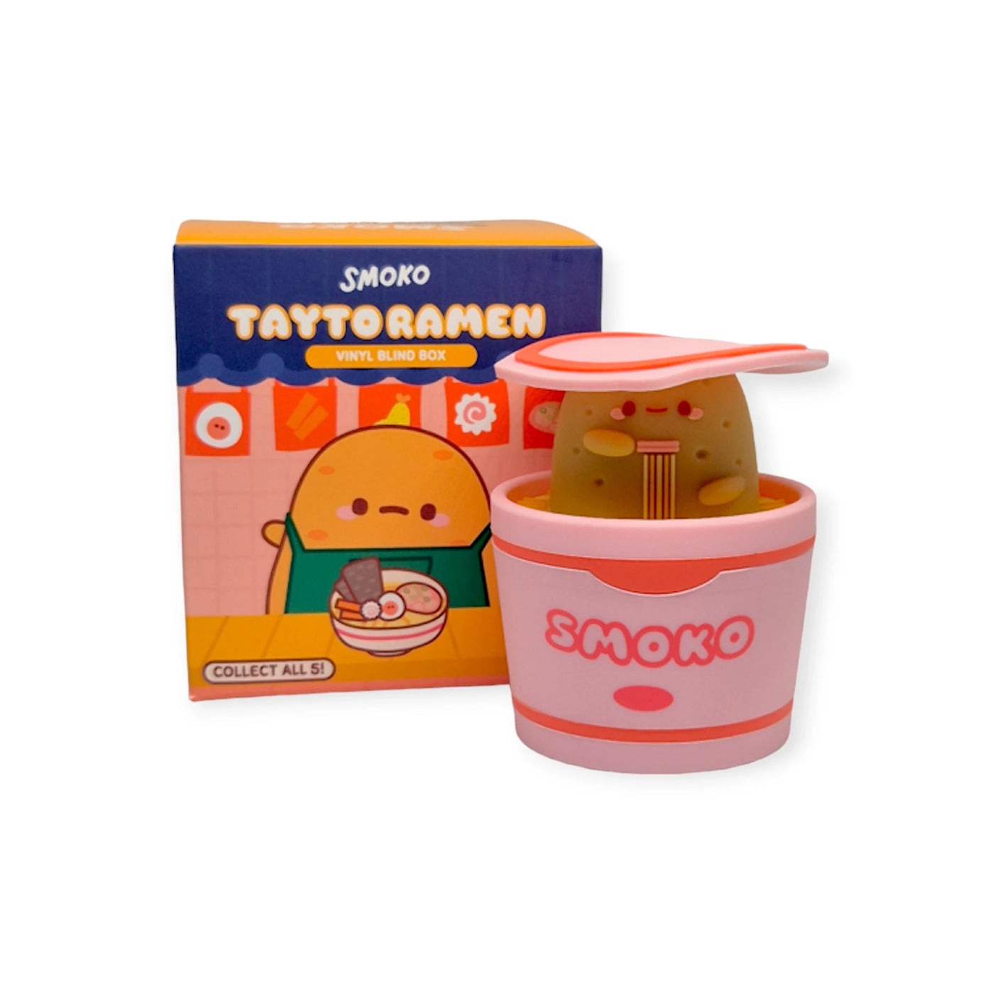 The Smoko Tayto Ramen Blind Box includes a vinyl figure of Tayto in a ramen cup, and its packaging features the charming design and whimsical artwork with "Smoko" prominently displayed.