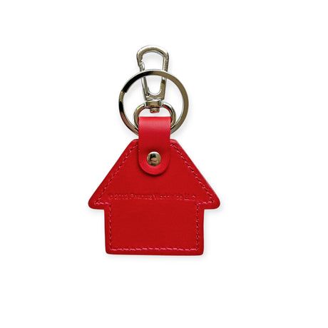 Red leather Snoopy kennel-shaped keychain with metal keyring and lobster clasp made in Japan