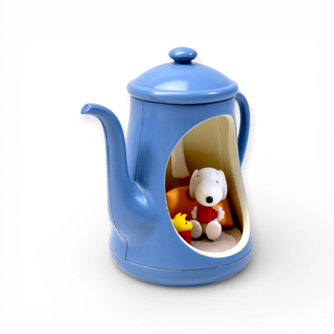 Blue teapot blind box with open side showing Snoopy and dog figure