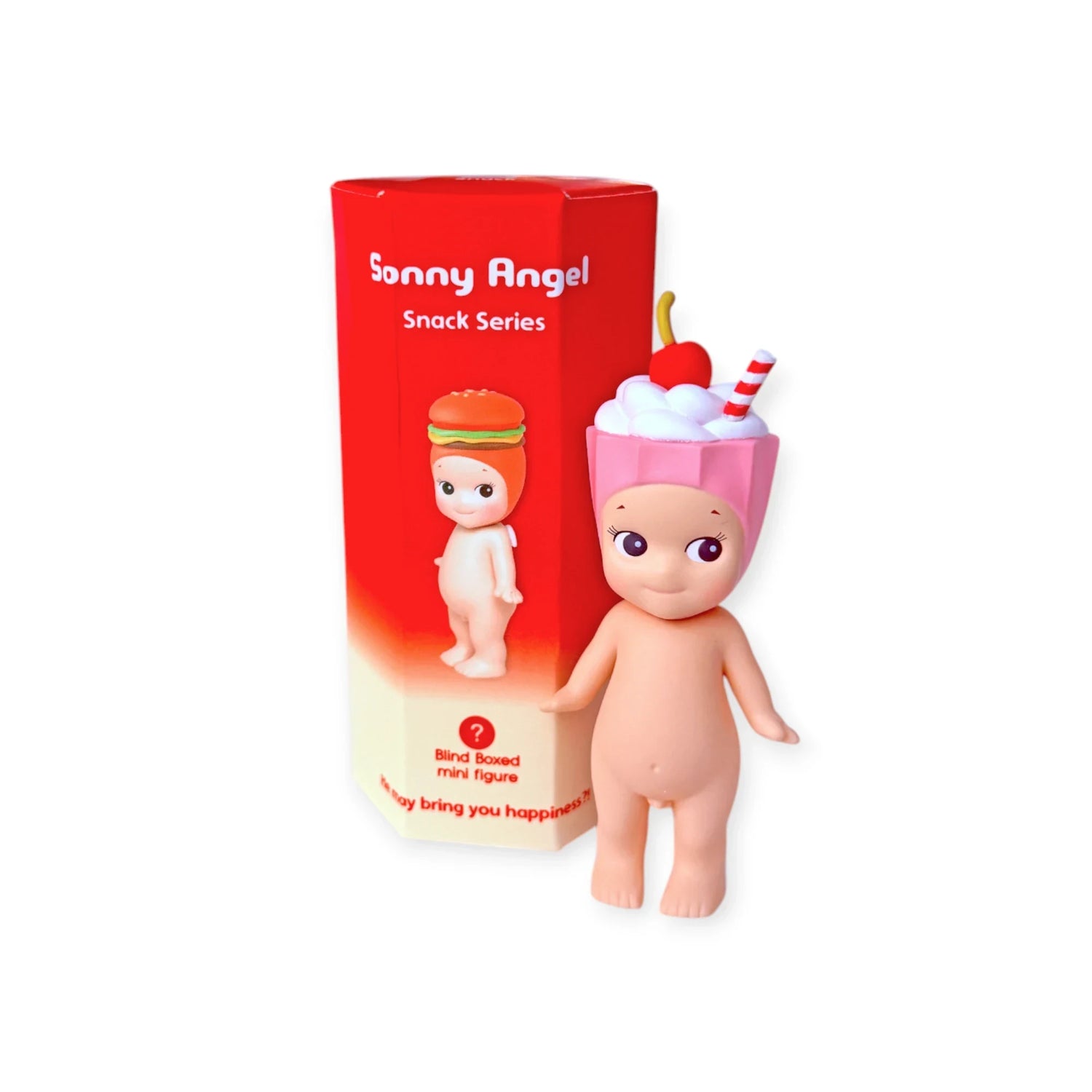 A Sonny Angel Snack Series - Blind Box mini-figure by Sonny Angel, featuring a pink cup and dessert topping on its head, stands beside its red and white blind box packaging.
