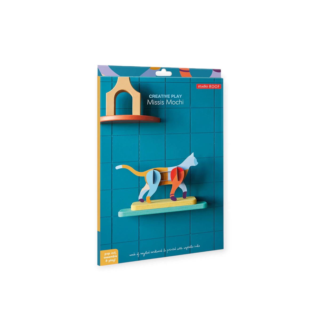 Studio Roof’s “Wall Art Puzzle - Mochi Cat” features a vibrant, abstract 3D cat design on a blue grid background—an eco-friendly, unique wall art piece.