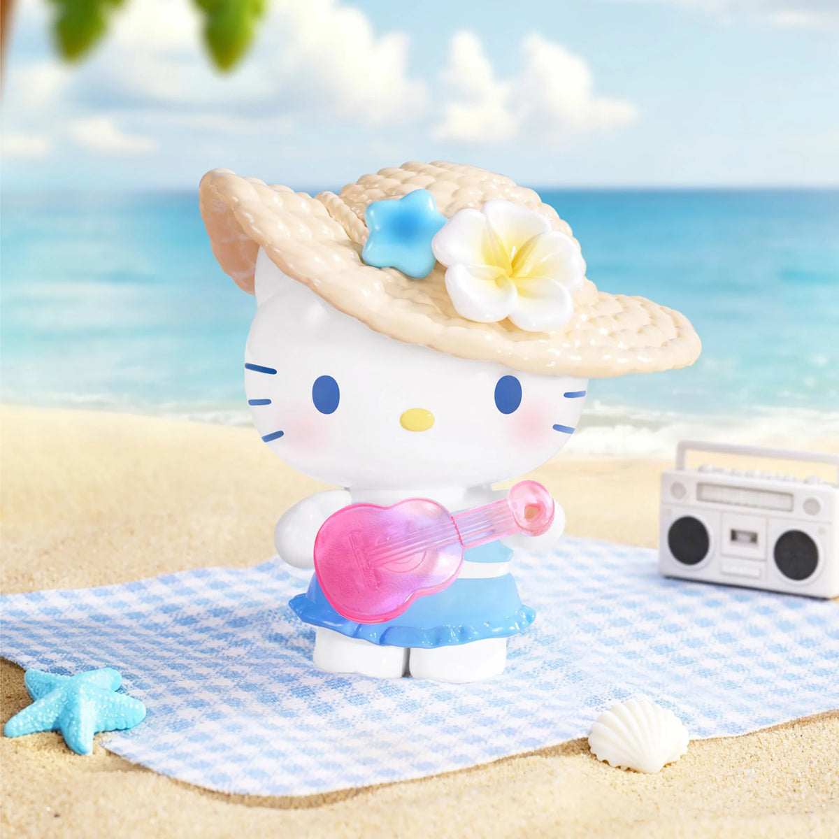 Hello Kitty summer beach blind box figure with floral hood and pink guitar