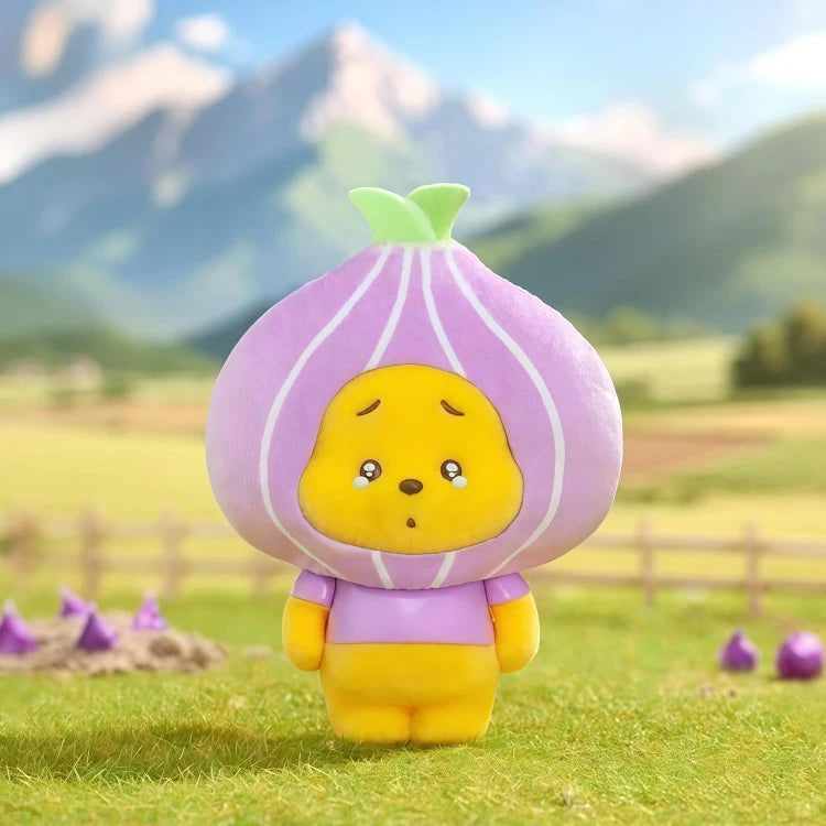 Onion-shaped purple fruit plush keychain with yellow face and white stripes