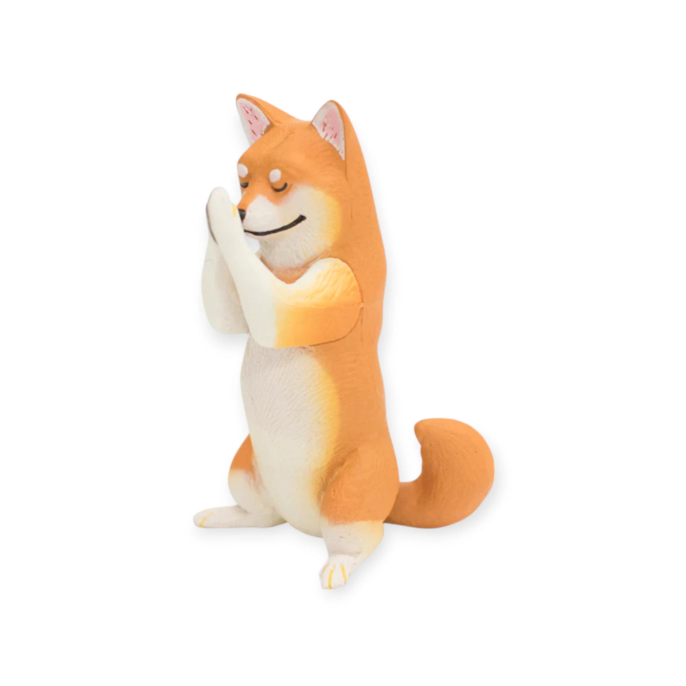 A Shiba Inu dog figurine from the Yell Praying Animals Blind Box series sits upright with front paws pressed together in a praying gesture—an adorable addition to this spiritual animal collection.