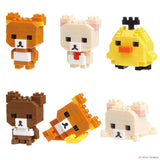 This Nanoblock Rilakkuma Blind Bag - Vol. 1 reveals six charming block-style animal figures, including two brown bears, one white bear with a red tie, a yellow bird, and another brown and white bear. One bear is lying down. They capture the delightful charm of Nanoblock creations.