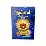 The Mighty Jaxx Kwistal Line Horoscope Primus Blind Box features a boxed figurine of a bear in a sheep costume with a small yellow chick, set against a zodiac-themed background.