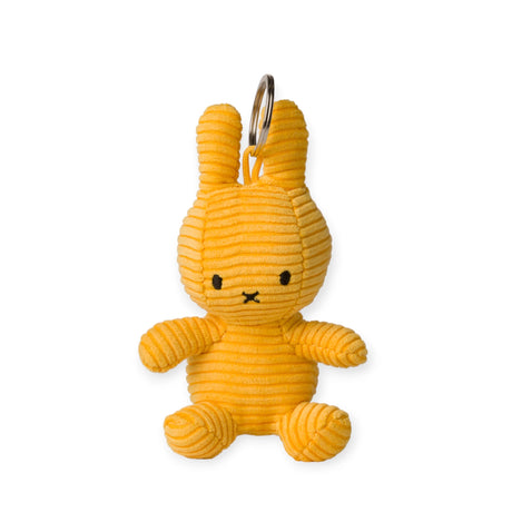 A 10cm Miffy Keychain Plush in eco-friendly corduroy, featuring black eyes and a minimalistic facial expression, similar to the Miffy Plush Keychain.