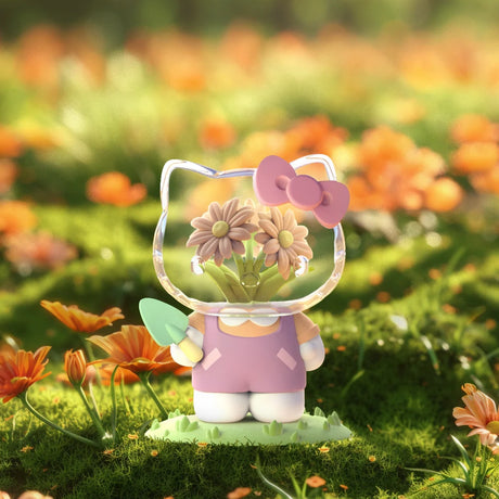 Hello Kitty vinyl figure with clear head and orange daisy flowers from Sanrio x Azuma Makoto blind box series, garden display