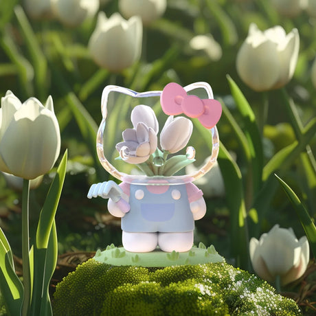 Hello Kitty vinyl figure with white tulip floral design by Azuma Makoto, displayed among tulip garden, gallery image 1