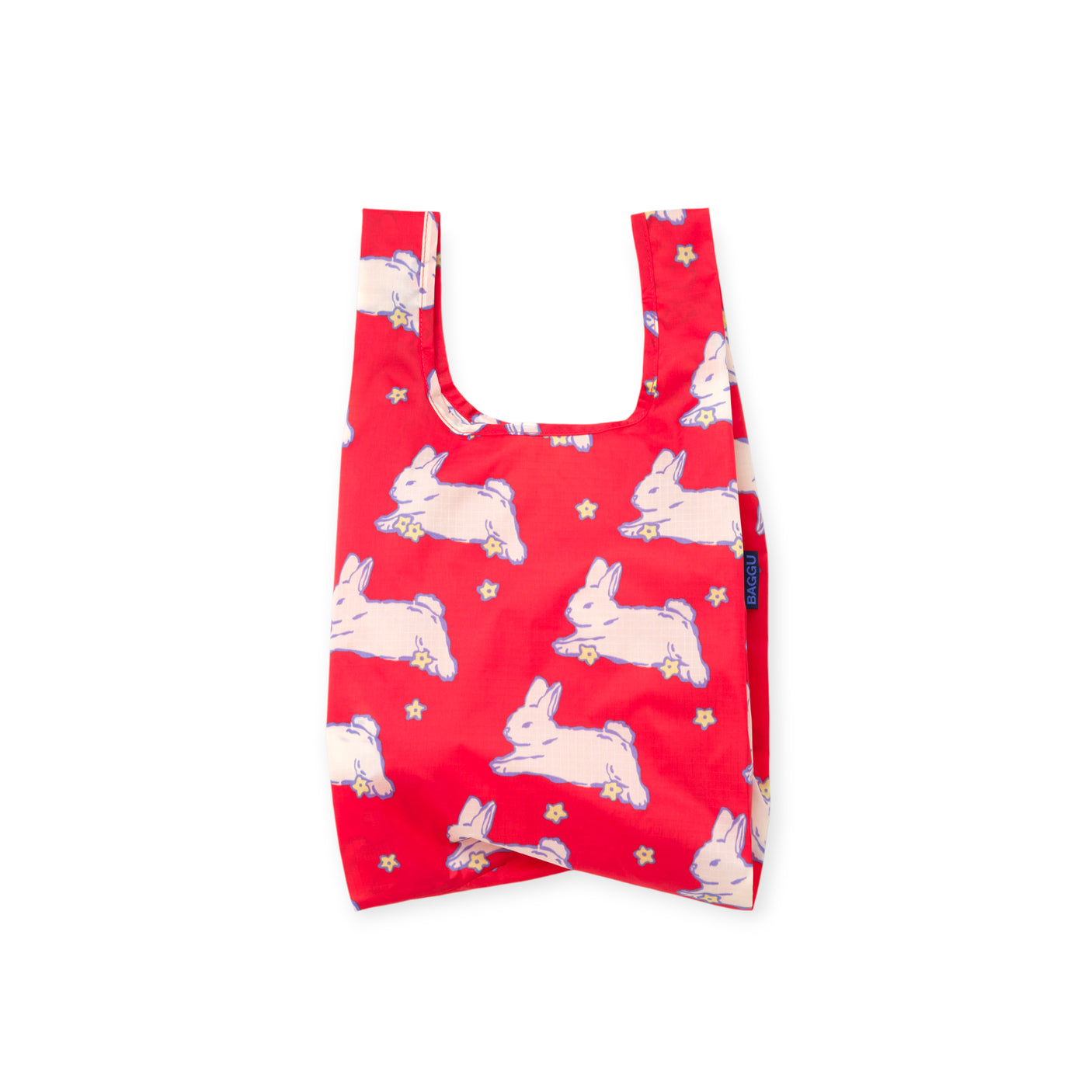 Red reusable bag patterned with white rabbits and small yellow flowers on a plain white background