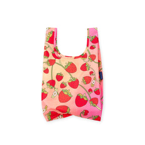 Baby Baggu baby bag with pink strawberry print, wide open top