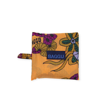 Compact Baby Baggu Bag in Wild Rabbit pattern with purple and green floral design on orange background, gallery 1, file 03.webp