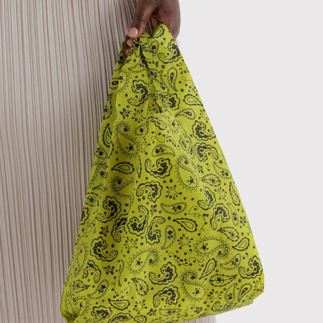Chartreuse paisley baby tote bag held up with gathered top opening