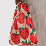 Baby Baggu bag with strawberry print, tote held by top handle
