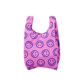 Pink baby tote bag with blue smiley face pattern