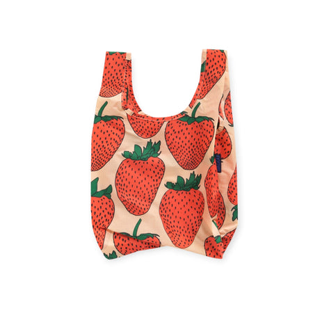 Introducing the Baggu Baby Baggu Reusable Bag - Strawberry, a charming tote bag adorned with a delightful strawberry pattern on a light background. Perfect for everyday errands or carrying essentials in style, this eco-friendly accessory combines functionality with whimsical flair.