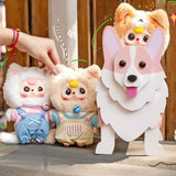 Three plush animal keychains with stitched faces in denim and light tan outfits; metal rings