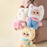 Set of three plush animal keychains with stitched faces and fabric outfits; metal key rings